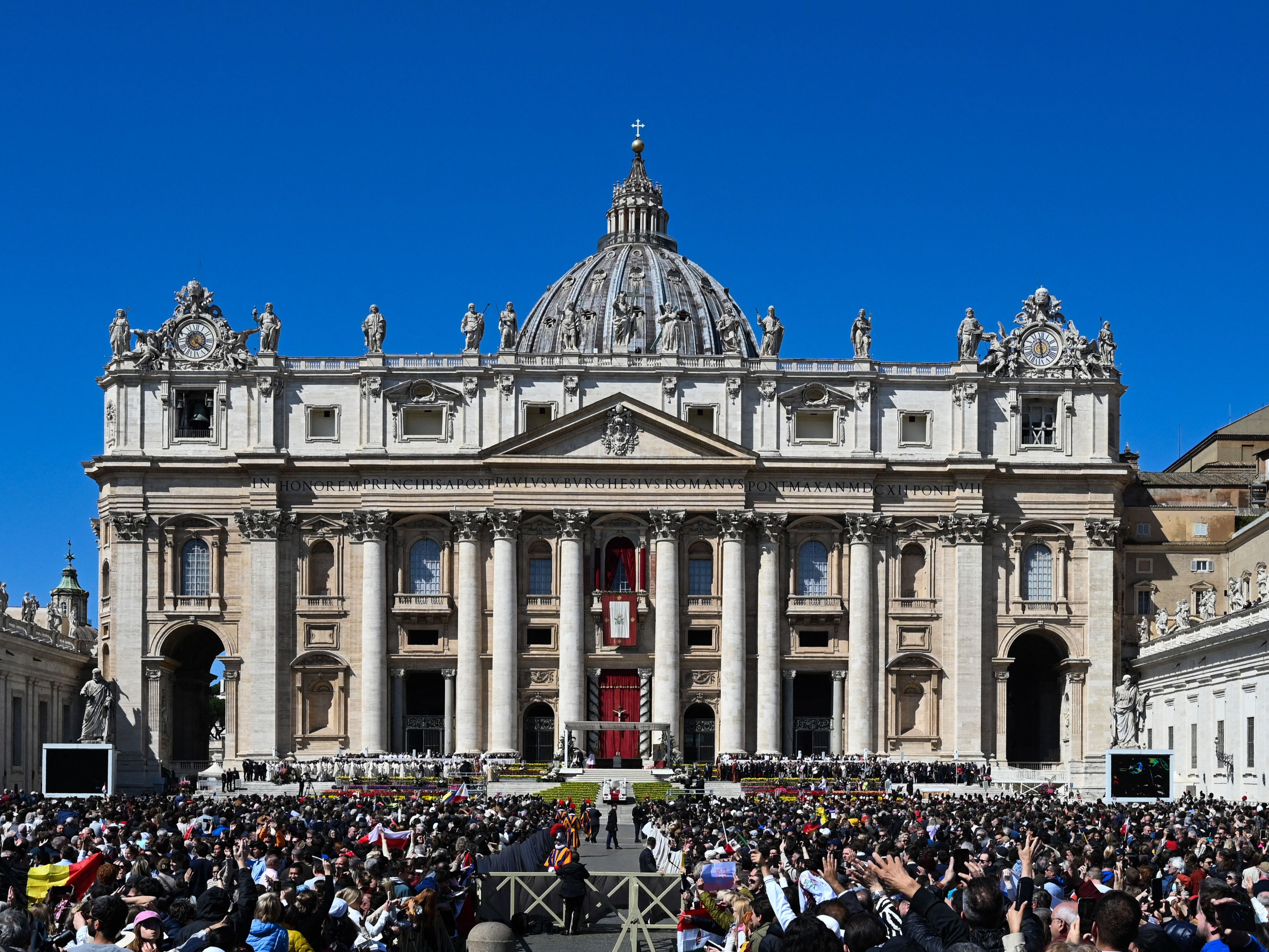 File photo: People wait below St Peter’s basilica at St Peter’s square, for the Pope to deliver the Urbi et Orbi message and blessing for Easter on 9 April 2023 in The Vatican