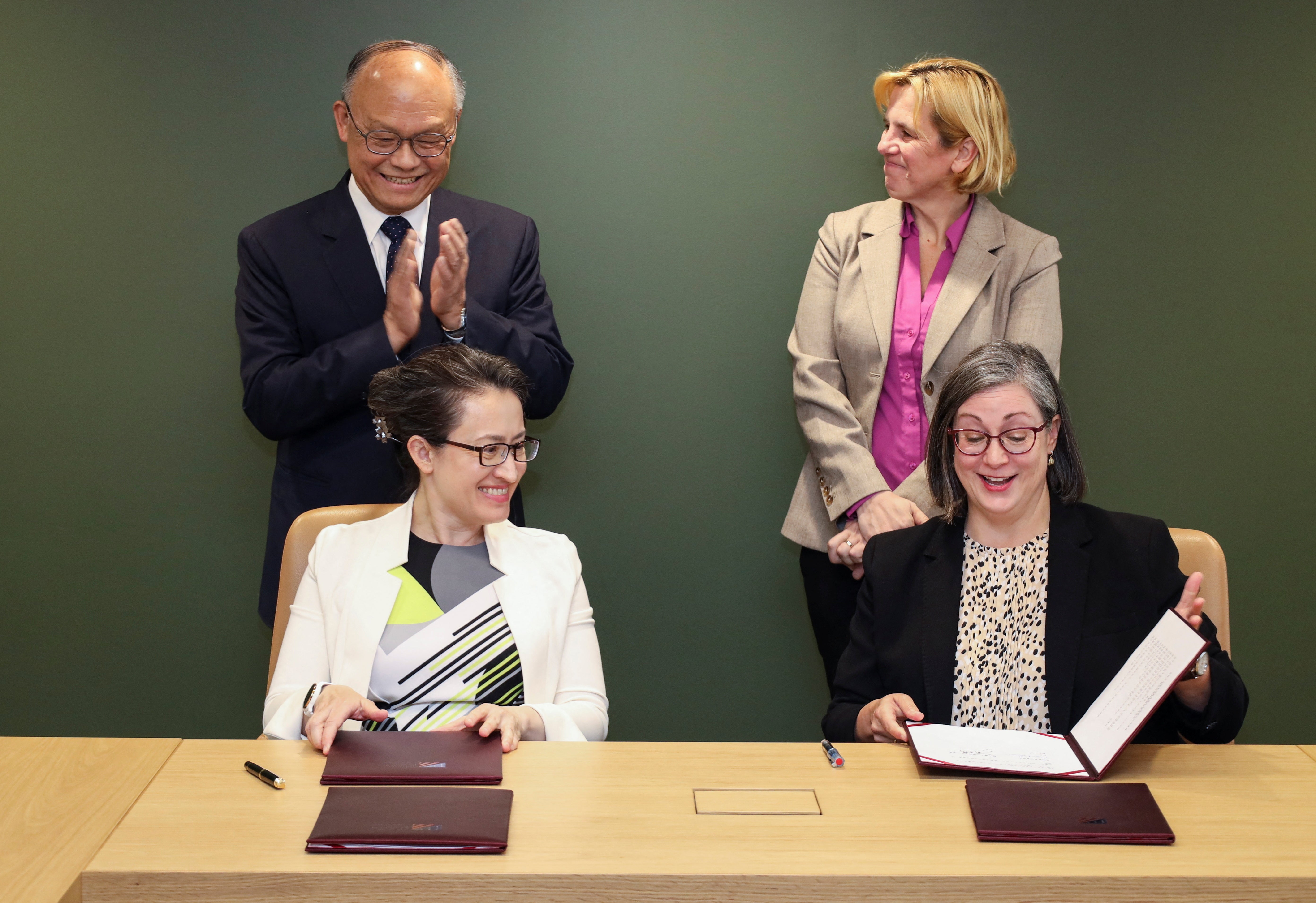 Taiwan and US representatives participate in a signing ceremony near Washington