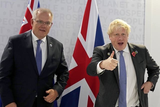 <p>Boris Johnson (right) with Australia’s PM Scott Morrison</p>