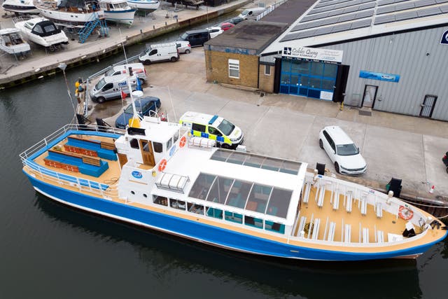 A cruise boat called the Dorset Belle which has been impounded at Cobb’s Quay Marina in Poole, Dorset, after a 17-year-old-boy and a girl aged 12 sustained “critical injuries” on Wednesday, and later died in hospital following an incident off Bournemouth beach (Andrew Matthews/PA)