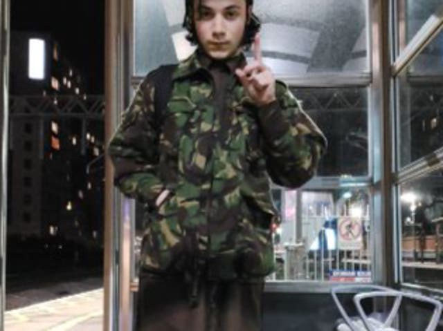 <p>Matthew King, then 18, in combat clothing he purchased online</p>