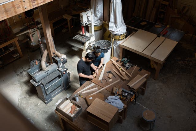 <p>Haomiao Huang, left, says woodworking is ‘a great bonding experience’ for him and his wife, Lydia The </p>