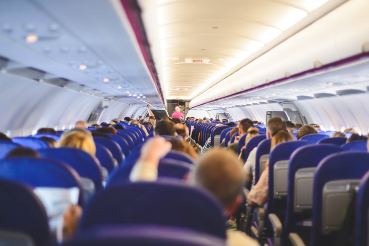 Airline offers passengers vouchers in bid to tackle overbooked flights this summer