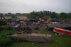 Indian officials end rescue work for 2 wrecked passenger trains that killed over 300 people