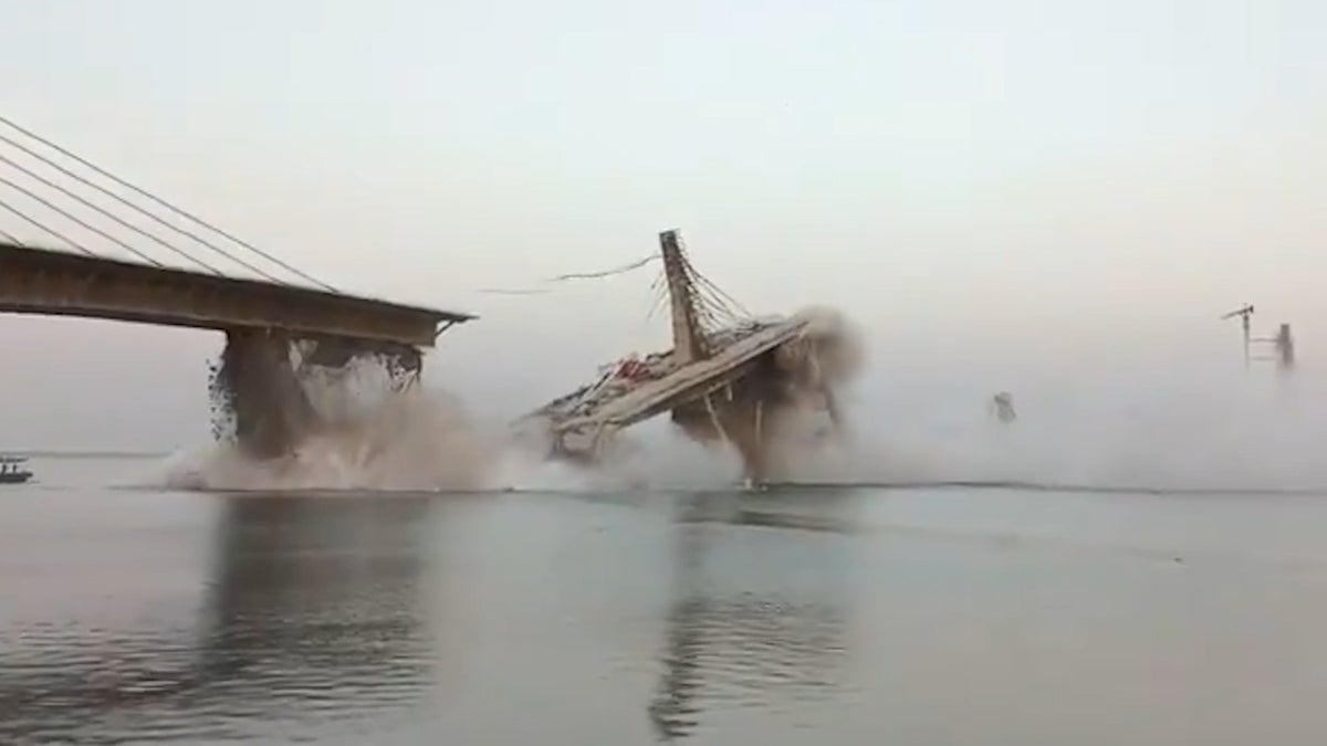 Moment under-construction bridge collapses into river in Northern India