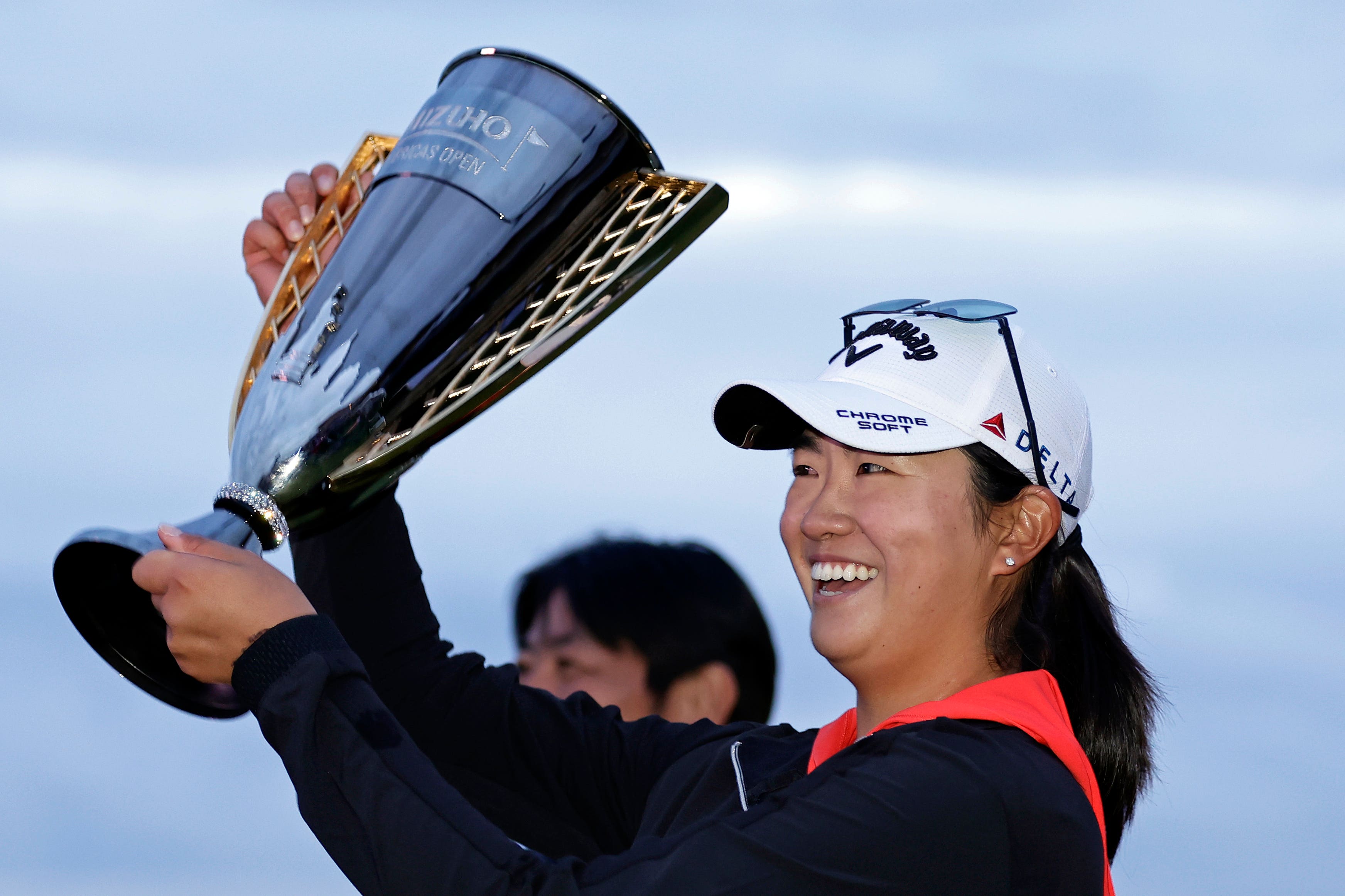 Rose Zhang holds up the trophy after winning the Mizuho Americas Open