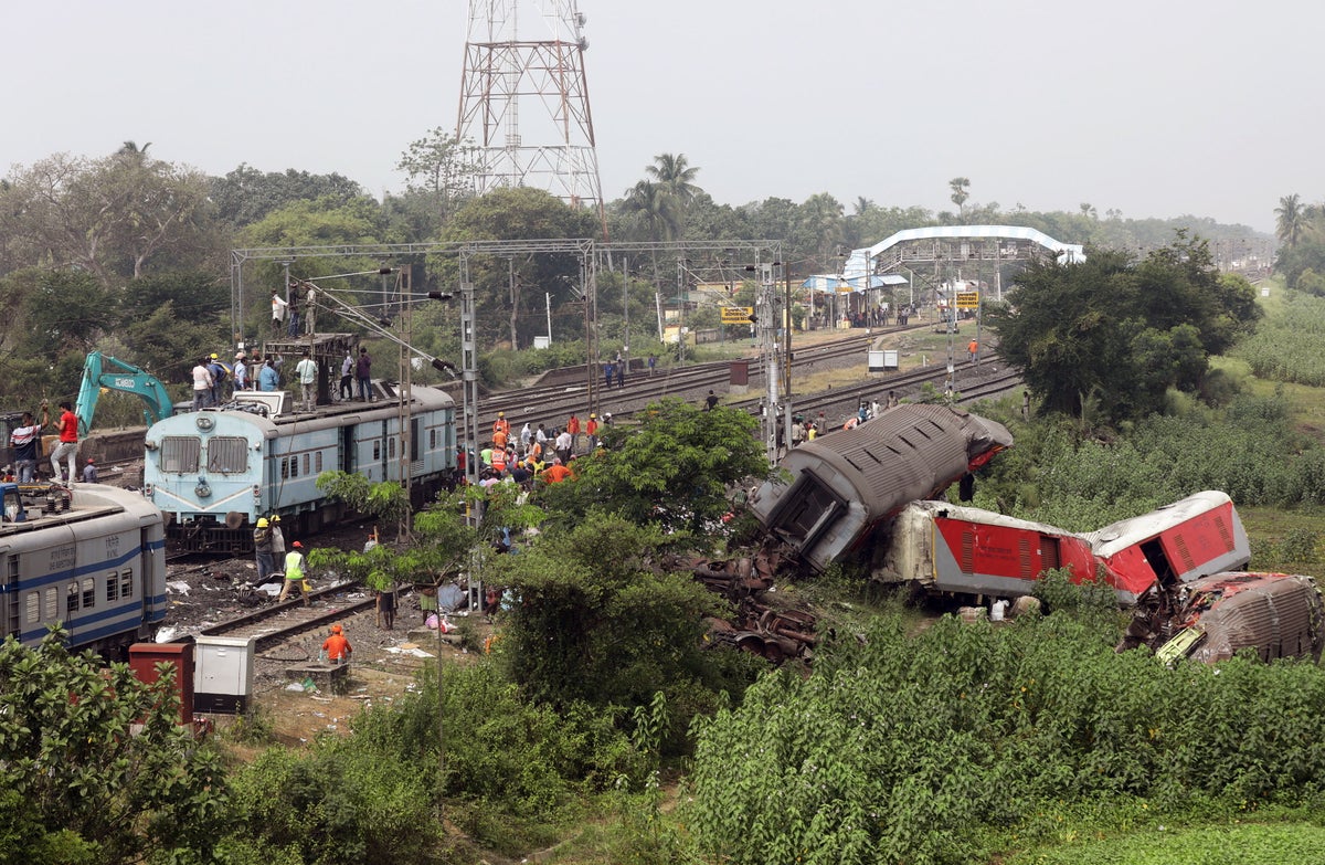 India train crash – latest: Services resume as most likely cause of deadly accident identified