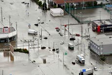 Rescuers in Japan search for 3 missing in or near rivers swollen by heavy rains last week