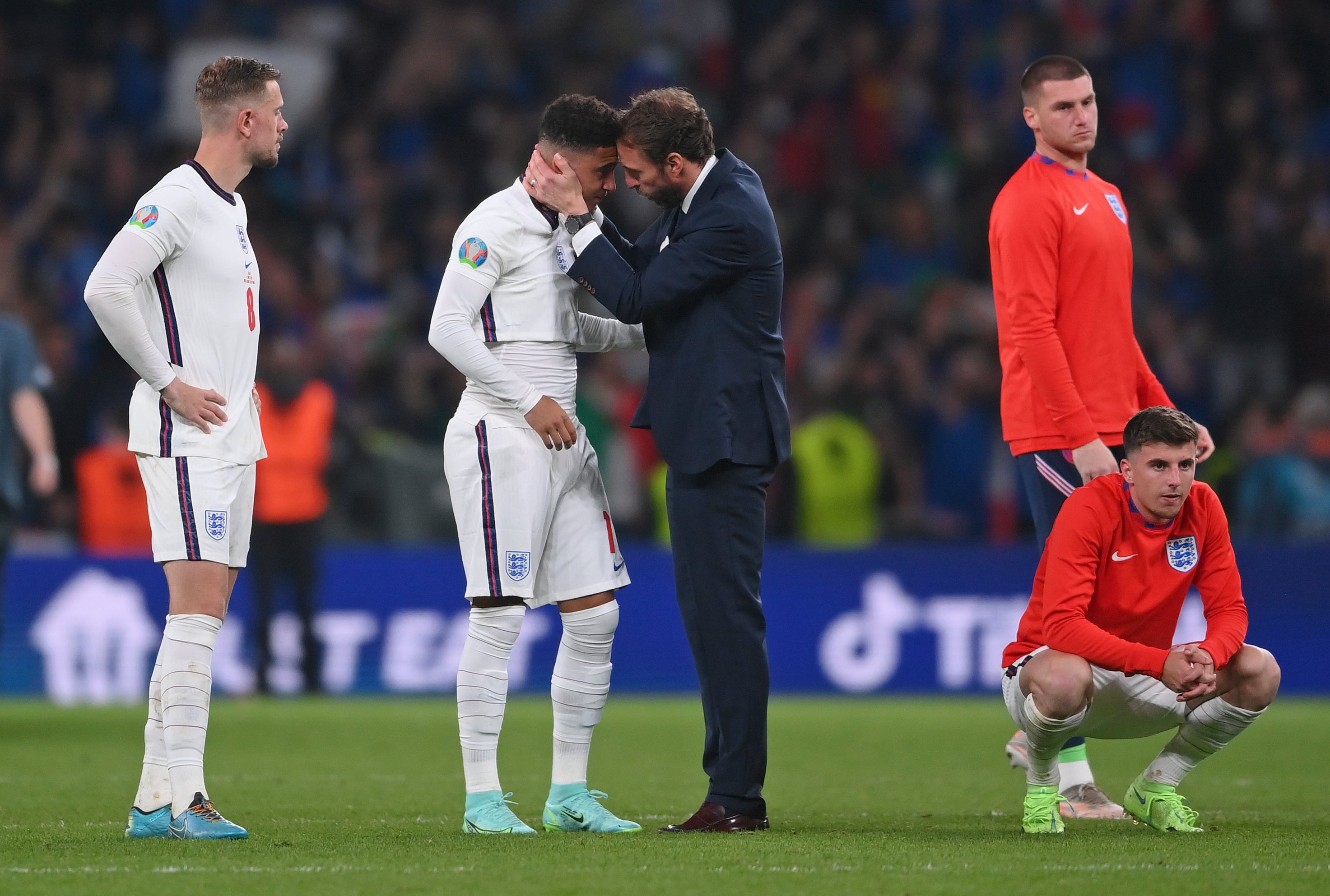 Gareth Southgate consoles Jadon Sancho after his penalty miss against Italy
