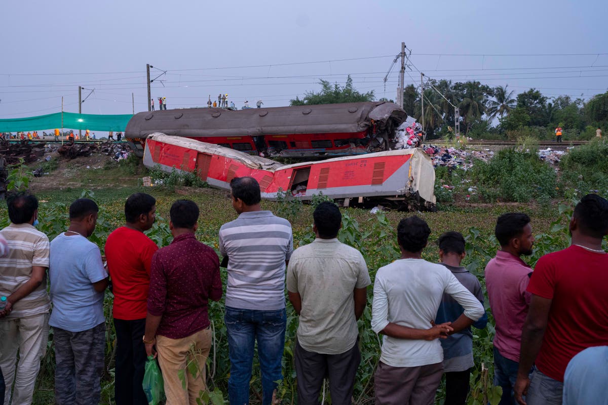 Watch live as workers on site of deadly train crash in India that killed at least 275 people