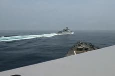 Near miss between Chinese warship and US destroyer caught on camera