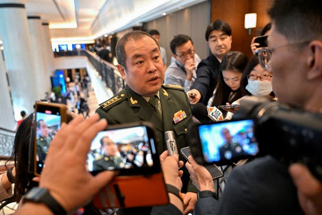 <p>Zhao Xiaozhuo, deputy director of the PLA Academy of Military Science, speaks to the media during the 20th IISS Shangri-La Dialogue in Singapore </p>