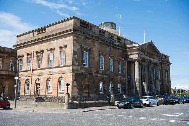 The 19 people appeared at Ayr Sheriff Court (John Linton/PA)