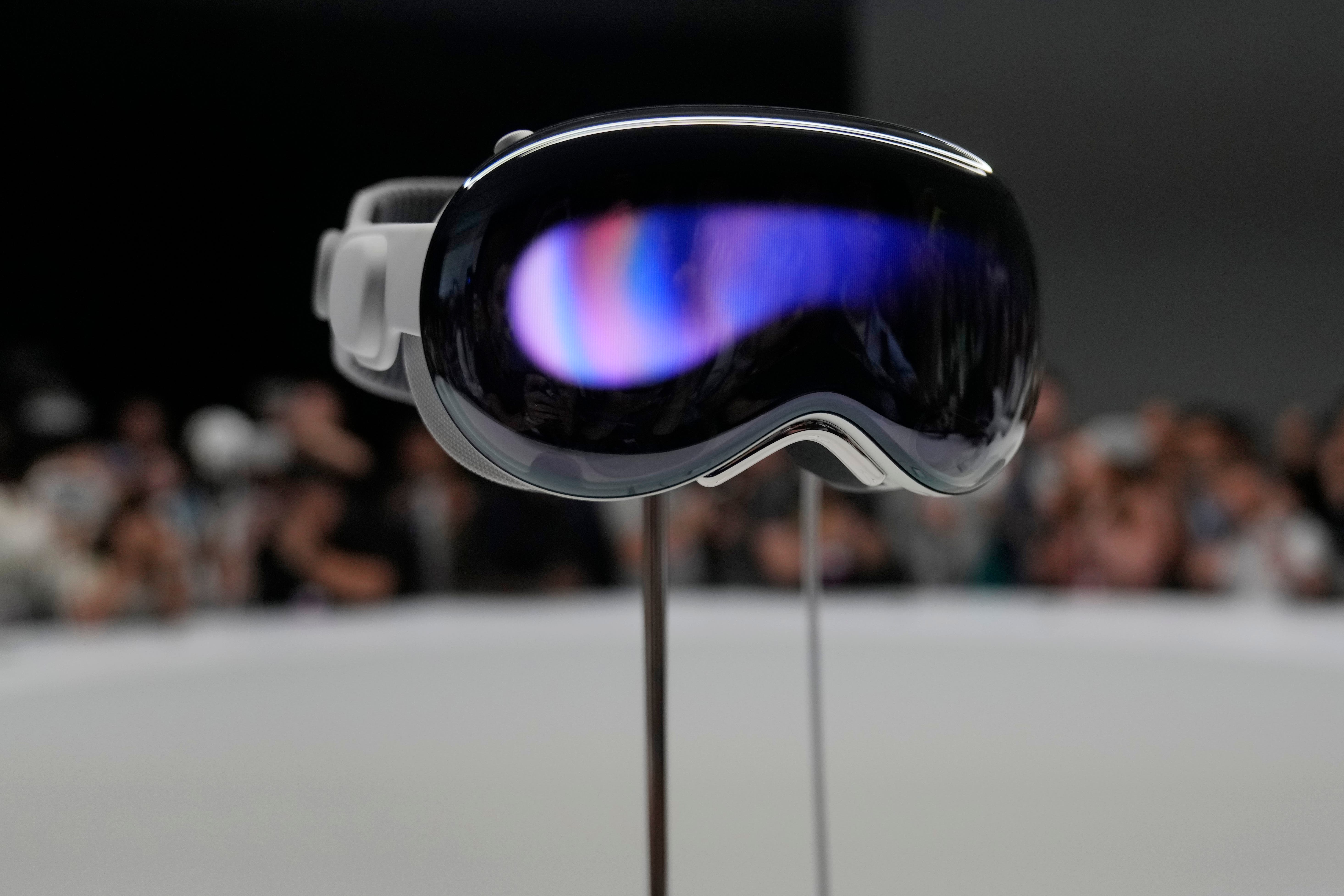 The Apple Vision Pro headset is displayed in a showroom on the Apple campus in Cupertino, California (AP Photo/Jeff Chiu)