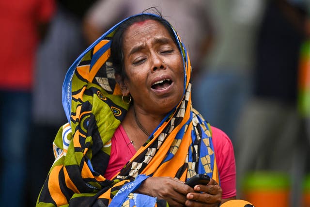 <p>A victim’s family member weeps at a business park used as temporary mortuary to identify the dead recovered from the wreckage of a three-train collision near Balasore, in India’s eastern state of Odisha</p>