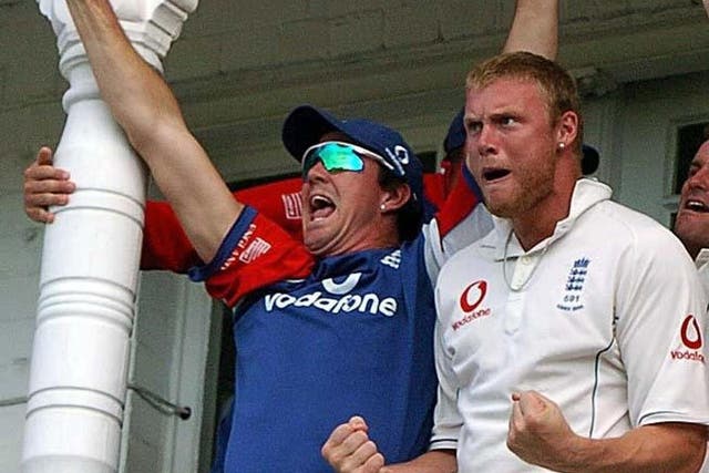 England’s Andrew Flintoff and Kevin Pietersen celebrate in 2005 (PA)