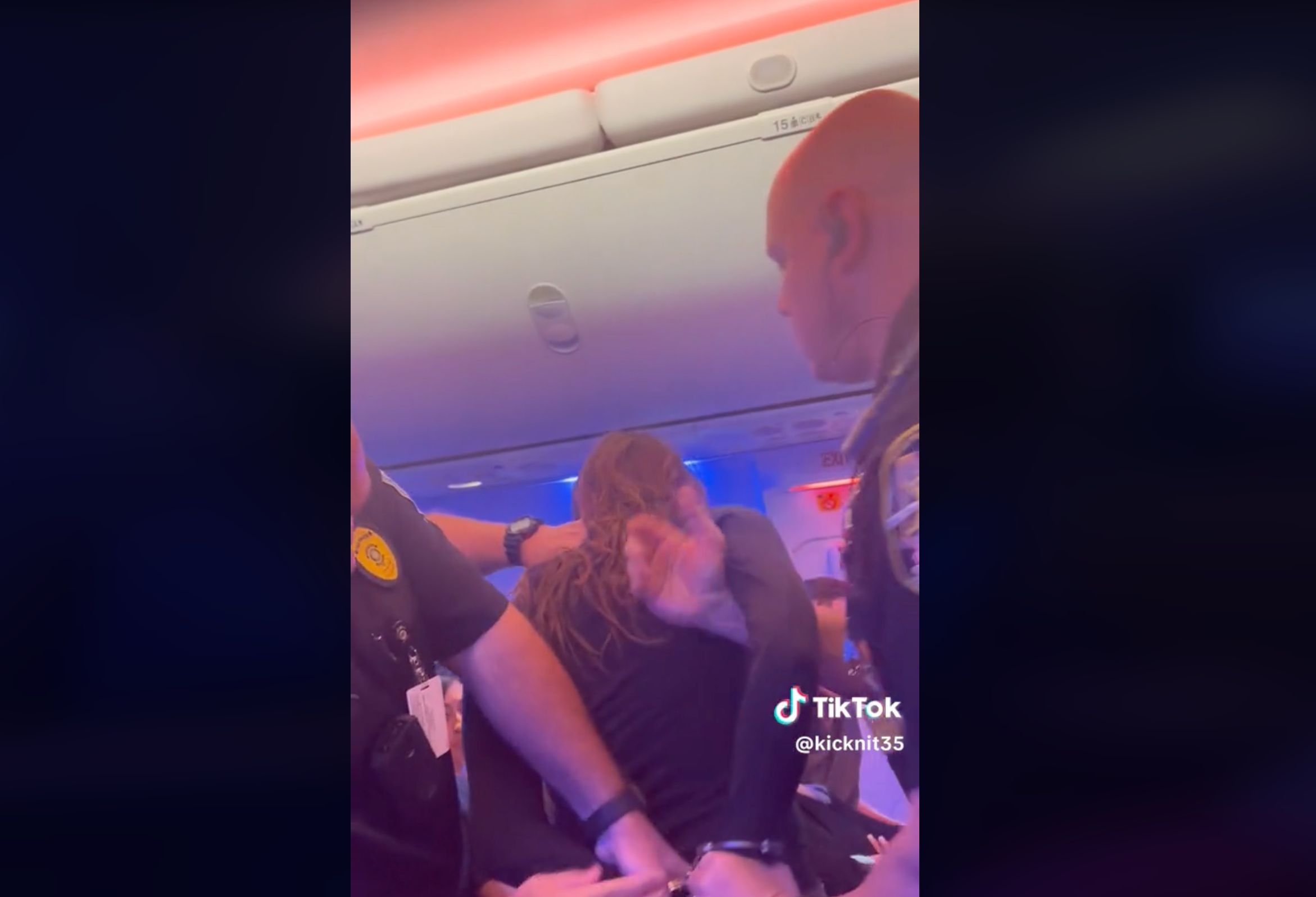The woman was eventually handcuffed
