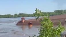 House floats down Dnipro river after Kakhovka dam attack floods nearby town