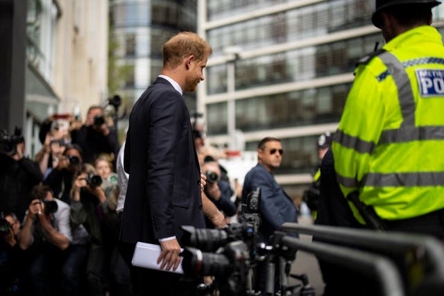 <p>Prince Harry leaves the High Court in London after giving evidence</p>