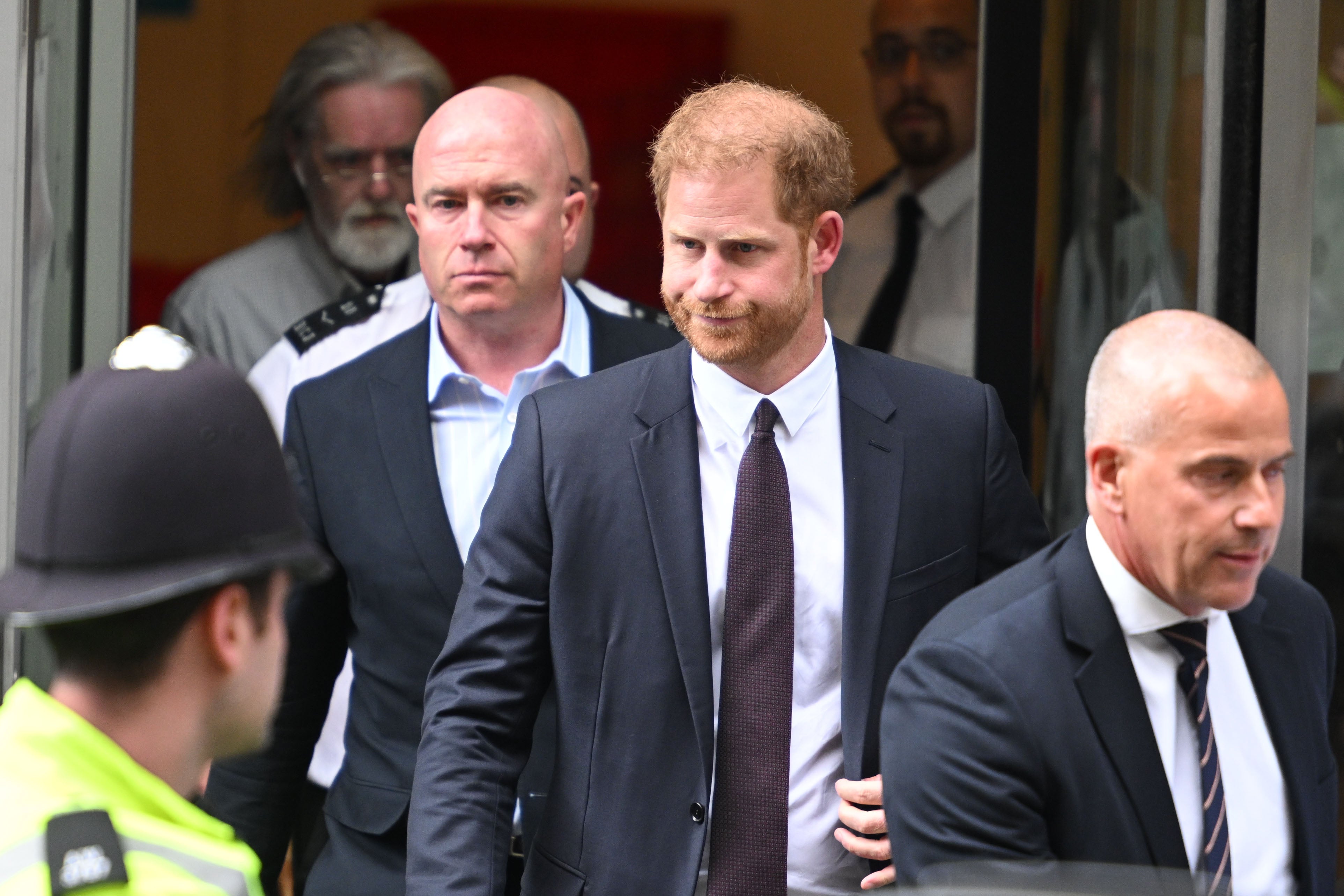 Prince Harry leaves after giving evidence at the Mirror Group Phone hacking trial
