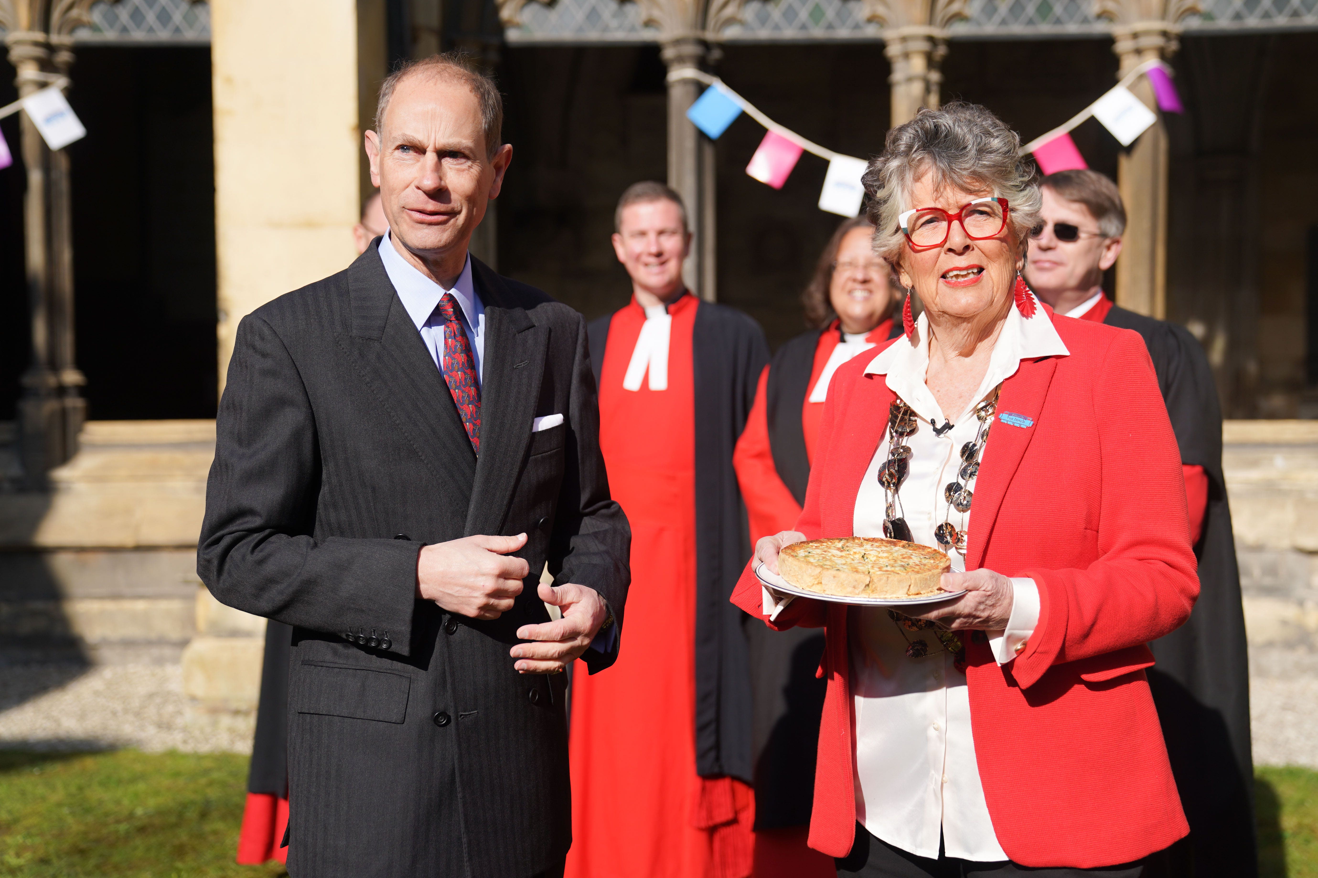 The Duke of Edinburgh and Coronation Big Lunch Ambassador Dame Prue Leith with the official coronation quiche at a Coronation Big Lunch hosted by the Archbishop of Canterbury (James Manning/PA)