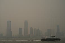 Air quality – live: New York air ‘worst in the world’ as Canada wildfires smoke fills skies and turns moon red