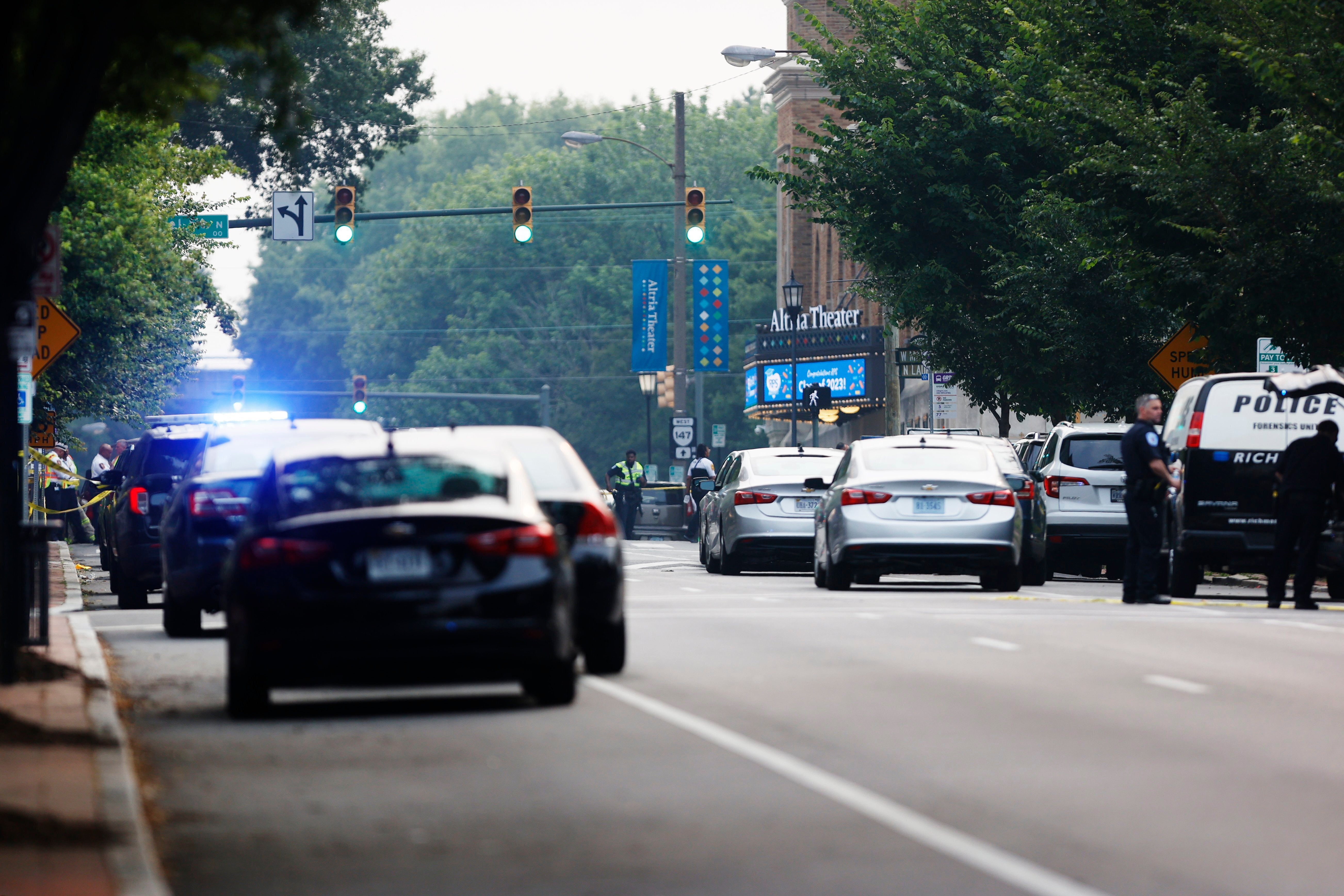 Police cars race to the scene