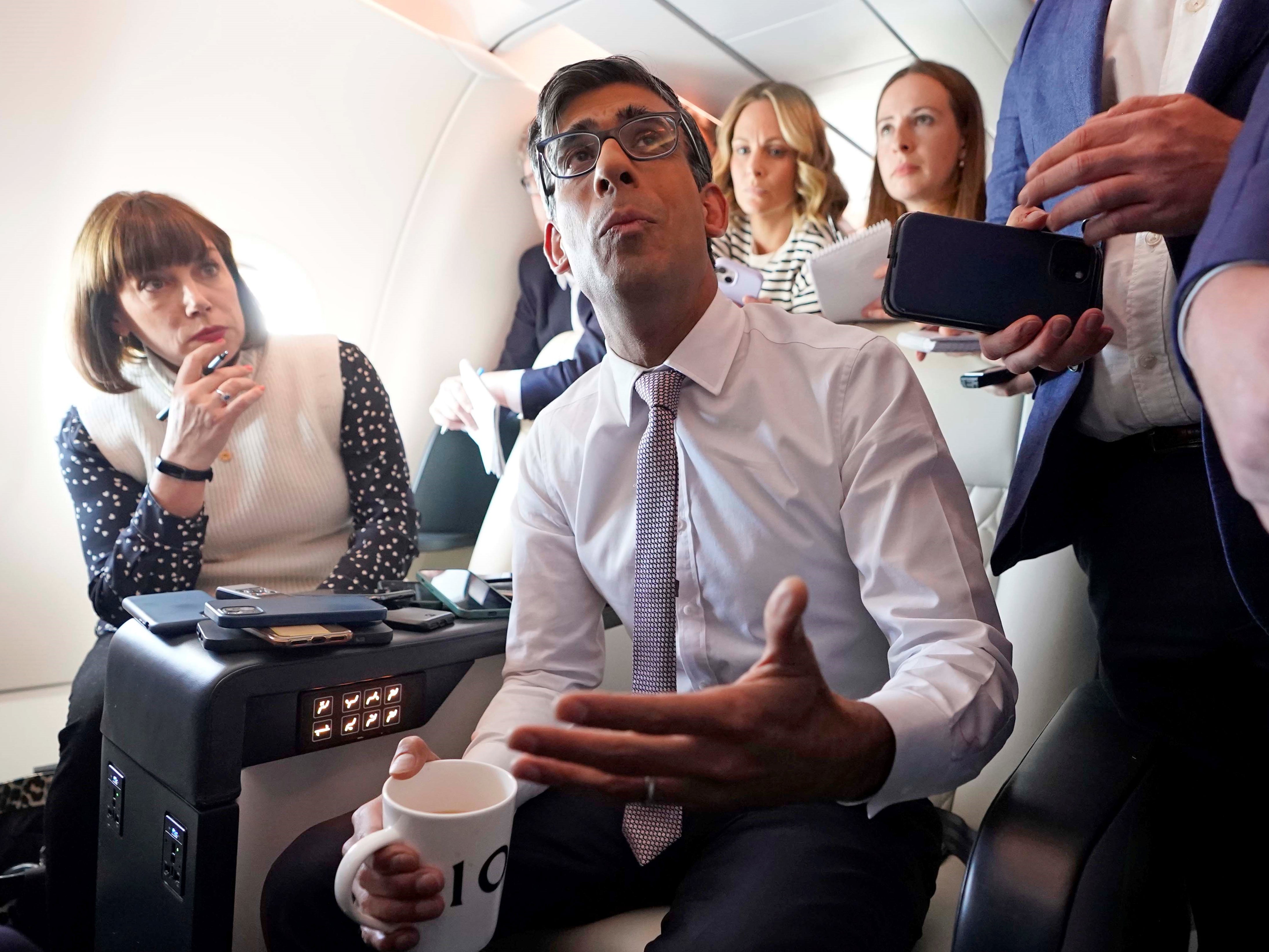 Rishi Sunak holds a huddle with political journalists on plane heading to US