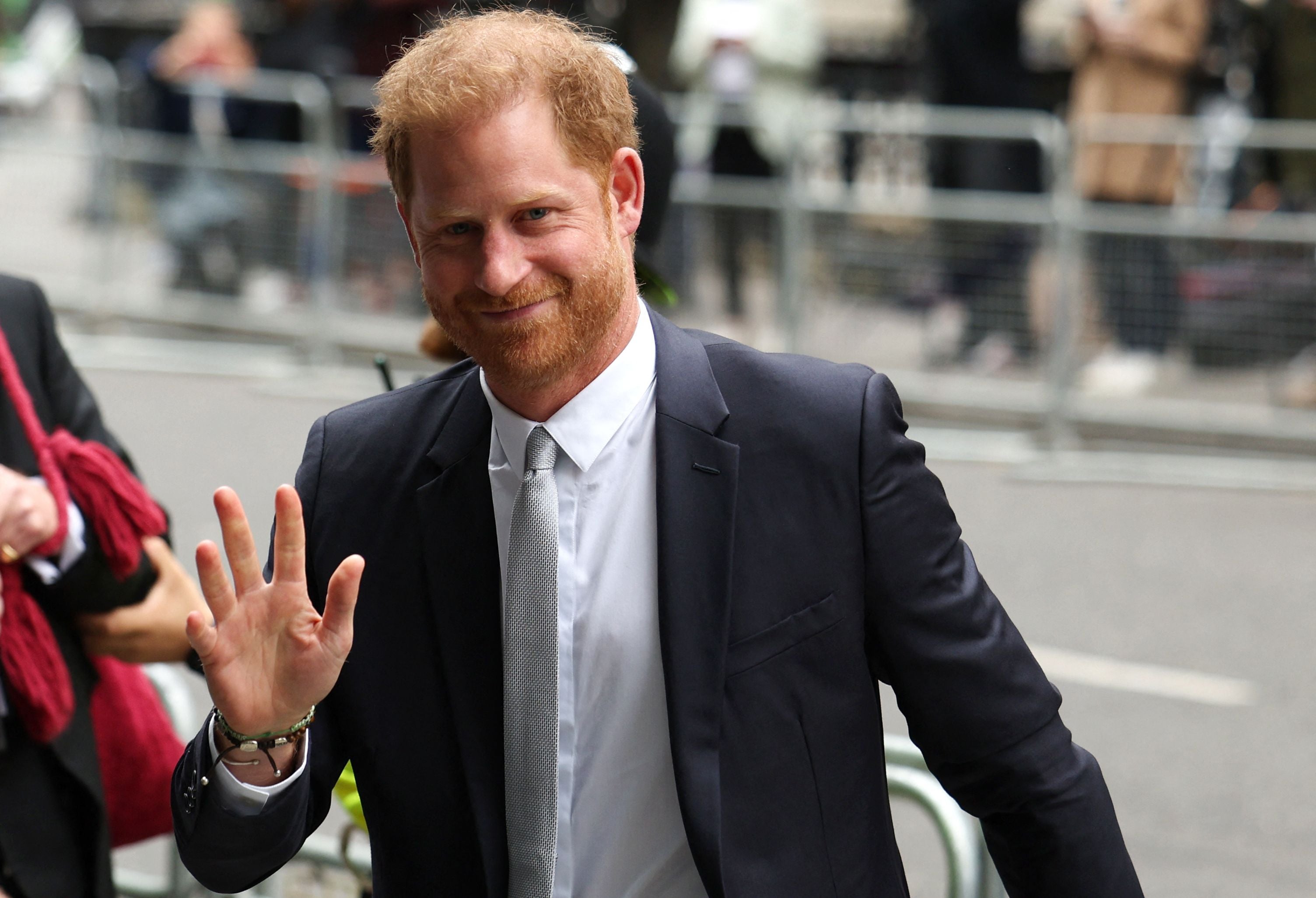 Prince Harry, Duke of Sussex, waves as he arrives to the Royal Courts of Justice, Britain's High Court, in central London on June 7, 2023