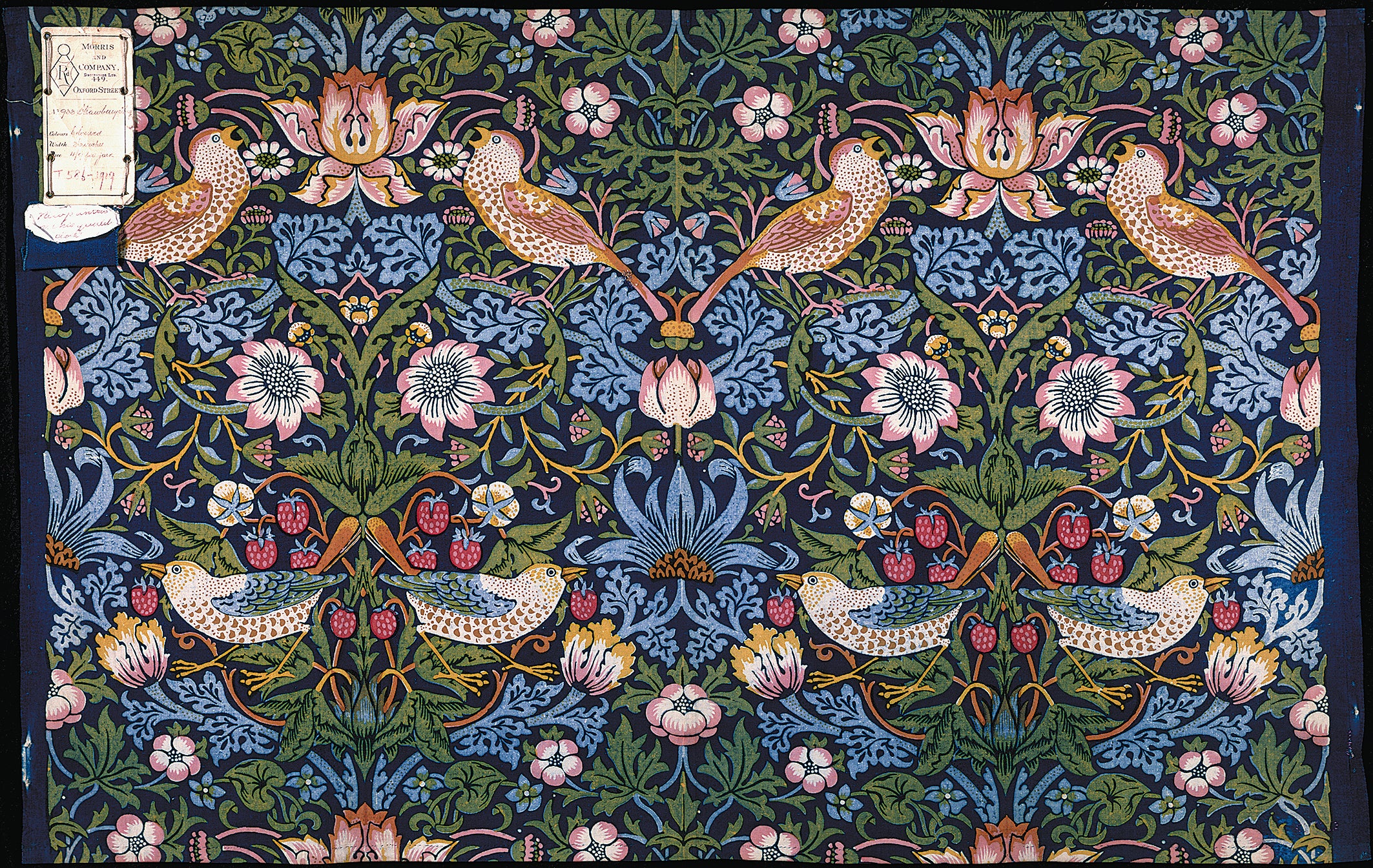 The Strawberry Thief textile pattern, designed by Morris and made around 1883, on indigo-discharged and block-printed cotton.