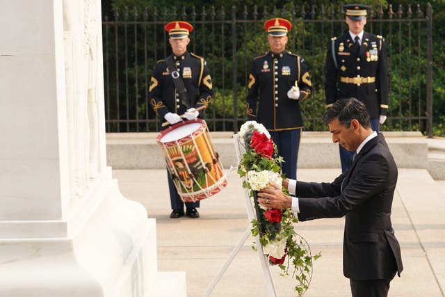Prime Minister Rishi Sunak laying a wreath at the Tomb of the Unknown Soldier in Arlington National Cemetery during his visit to Washington DC (Kevin Lamarque/PA)
