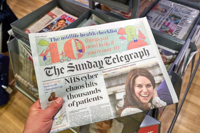The Daily and Sunday Telegraph and The Spectator magazine are set to be put up for sale (Alamy/PA)