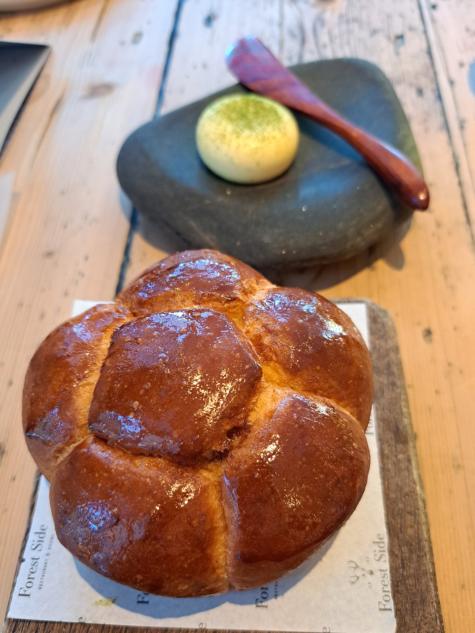 Glazed in Marmite, the milk loaves are baked before each service