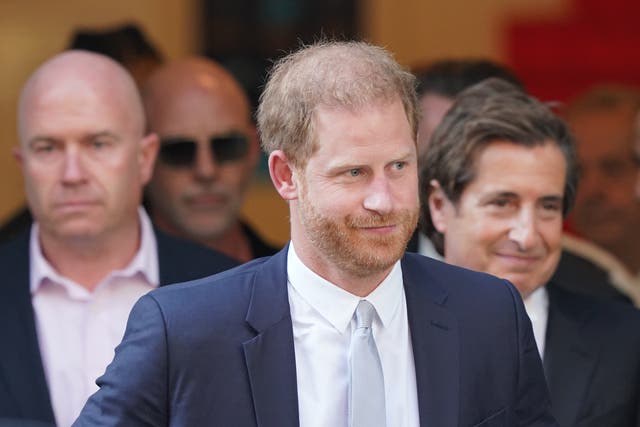 <p>Prince Harry leaves the High Court in London after he finished giving evidence on Wednesday</p>