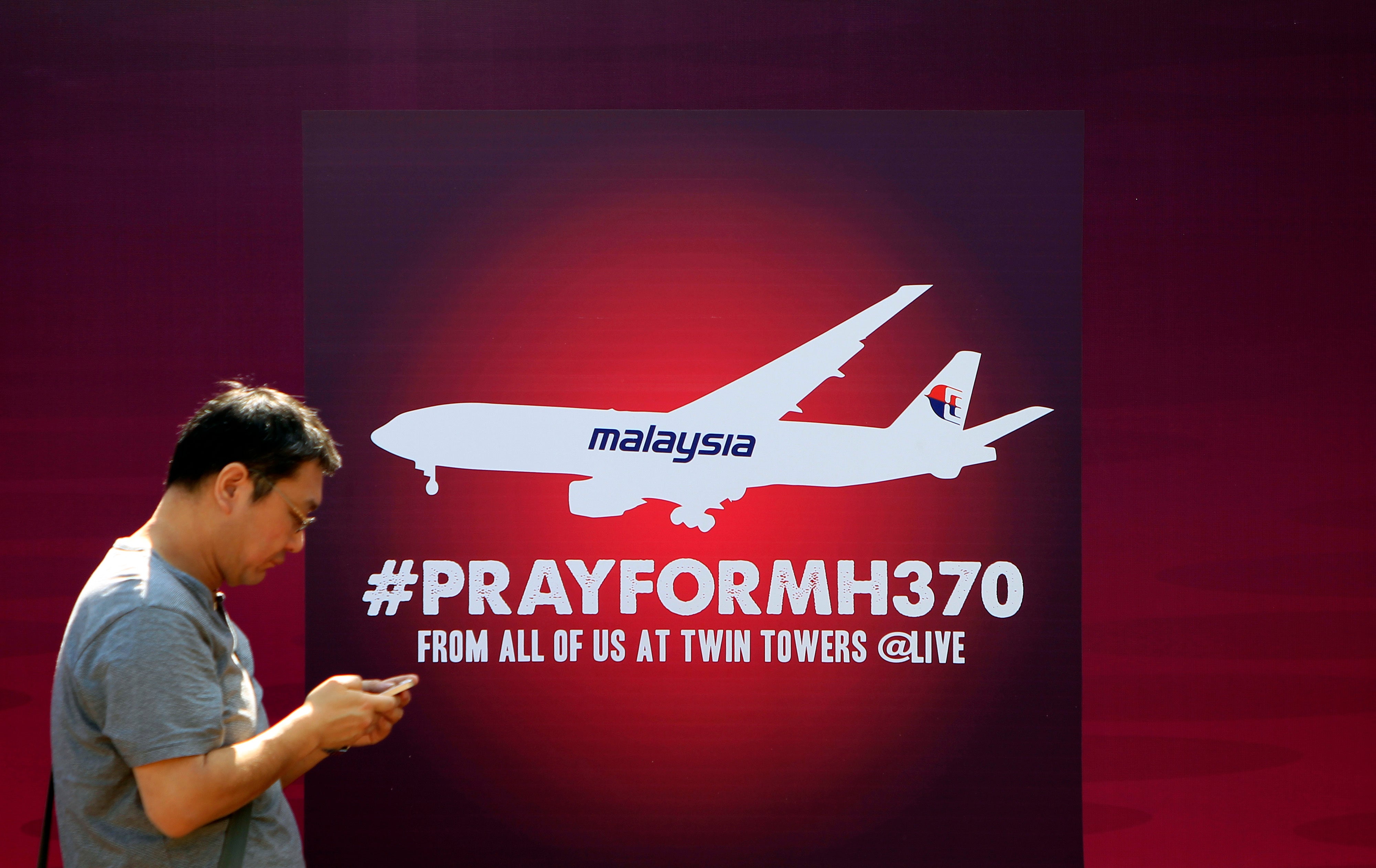 Missing persons: MH370 was lost with 239 passengers and crew on board