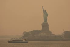 ‘It’s like being on Mars’: The smoke in the air in New York is so thick you can feel it in your lungs