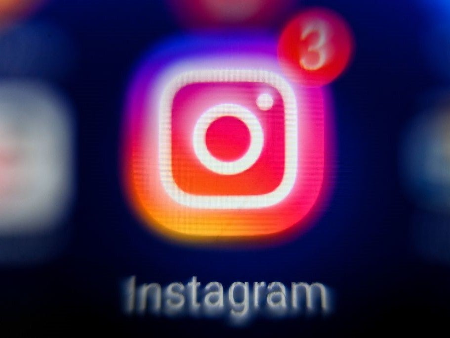 <p>Instagram’s logo displayed on a tablet screen on 18 October, 2021</p>