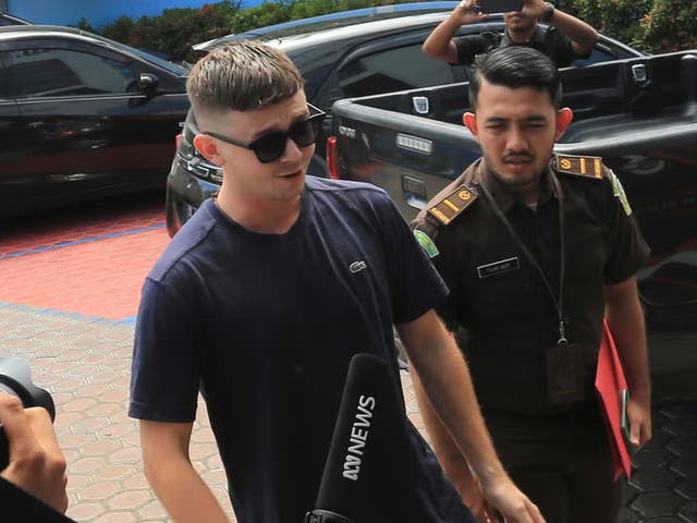 <p>Bodhi Risby-Jone arriving at a local immigration office in Indonesia</p>