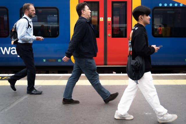 Passenger usage of Britain’s railways during the first three months of the year was 12% below pre-pandemic levels (James Manning/PA)