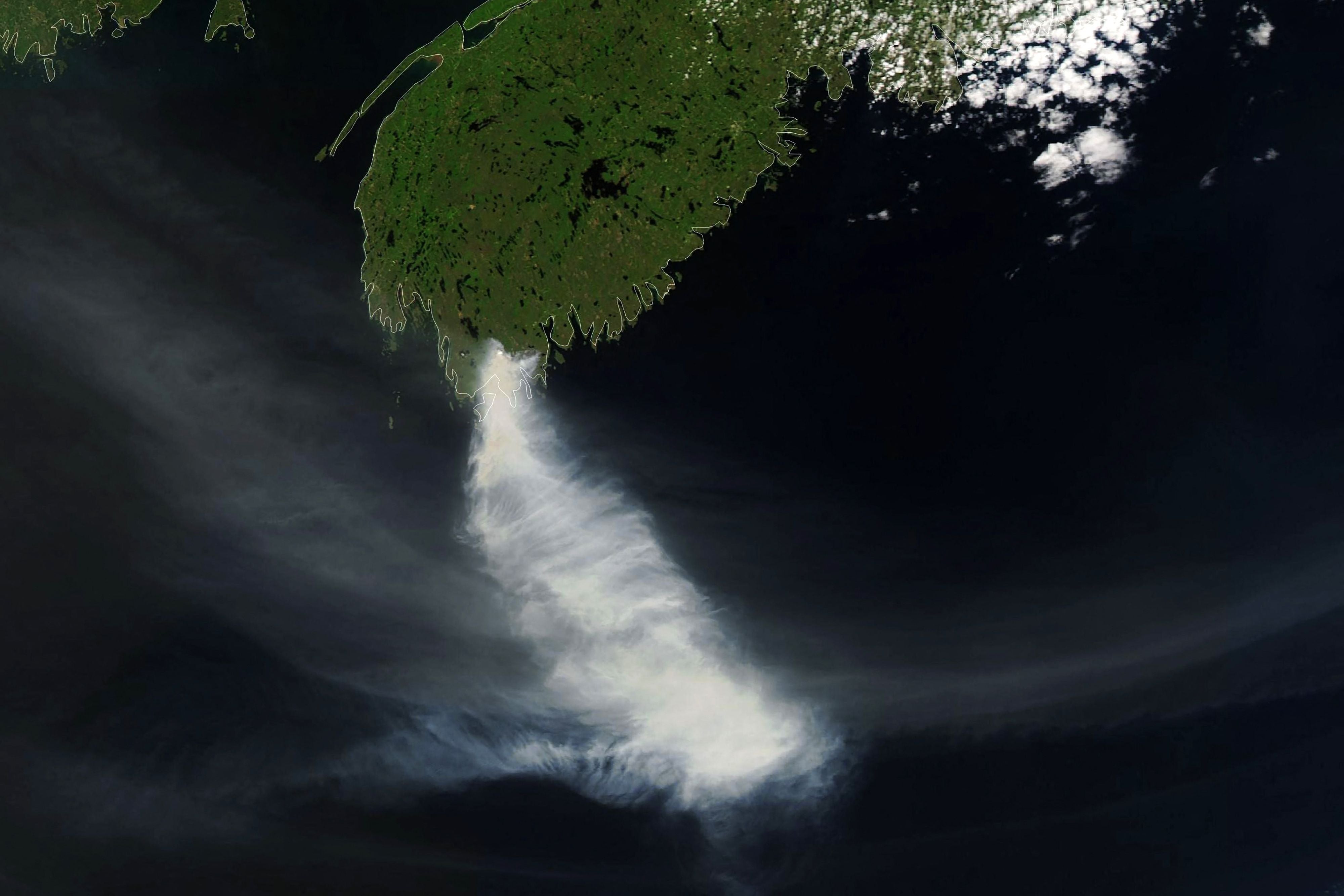 NASA’s Earth Observatory photo shows smoke billowing from fires near Shelburne, Nova Scotia, Canada.