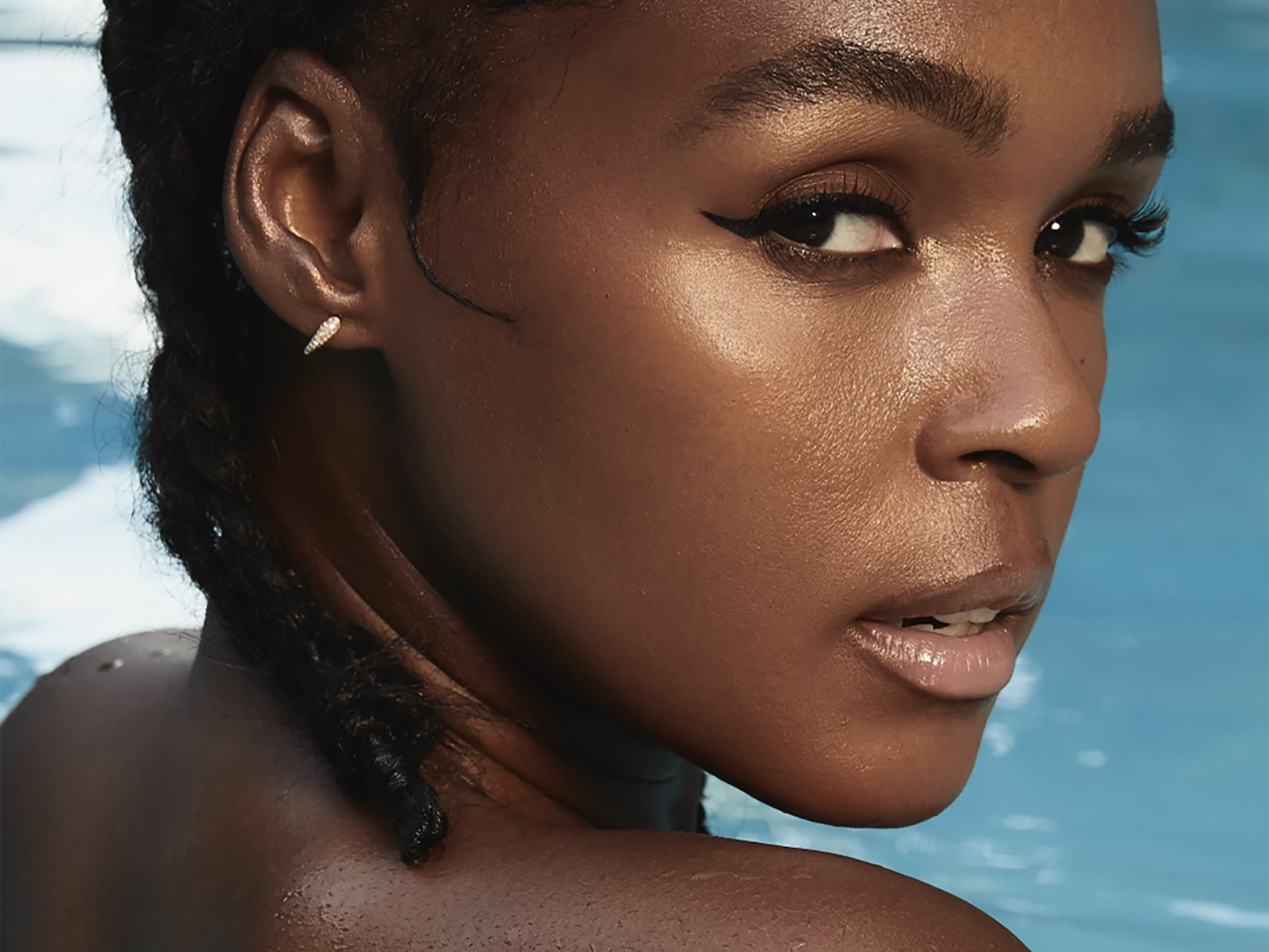 On her fourth album, Janelle Monáe embodies the happiest person at the orgy