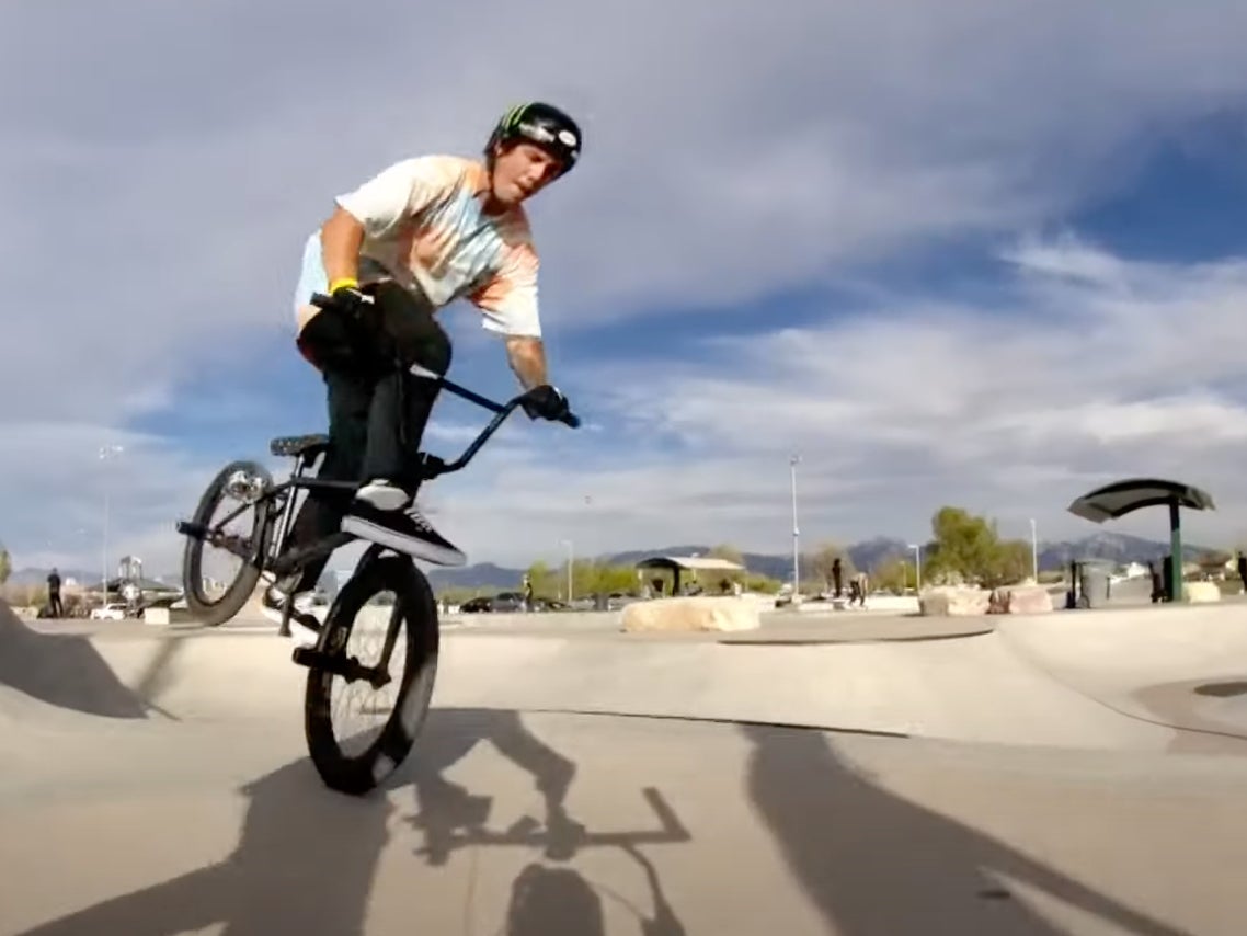Pro BMX rider Pat Casey rides a bike during a video shoot