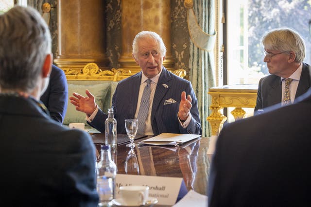 The King during a meeting with representatives from the charities of the Disasters Emergency Committee at Buckingham Palace (Andy Aitchison/DEC/PA)