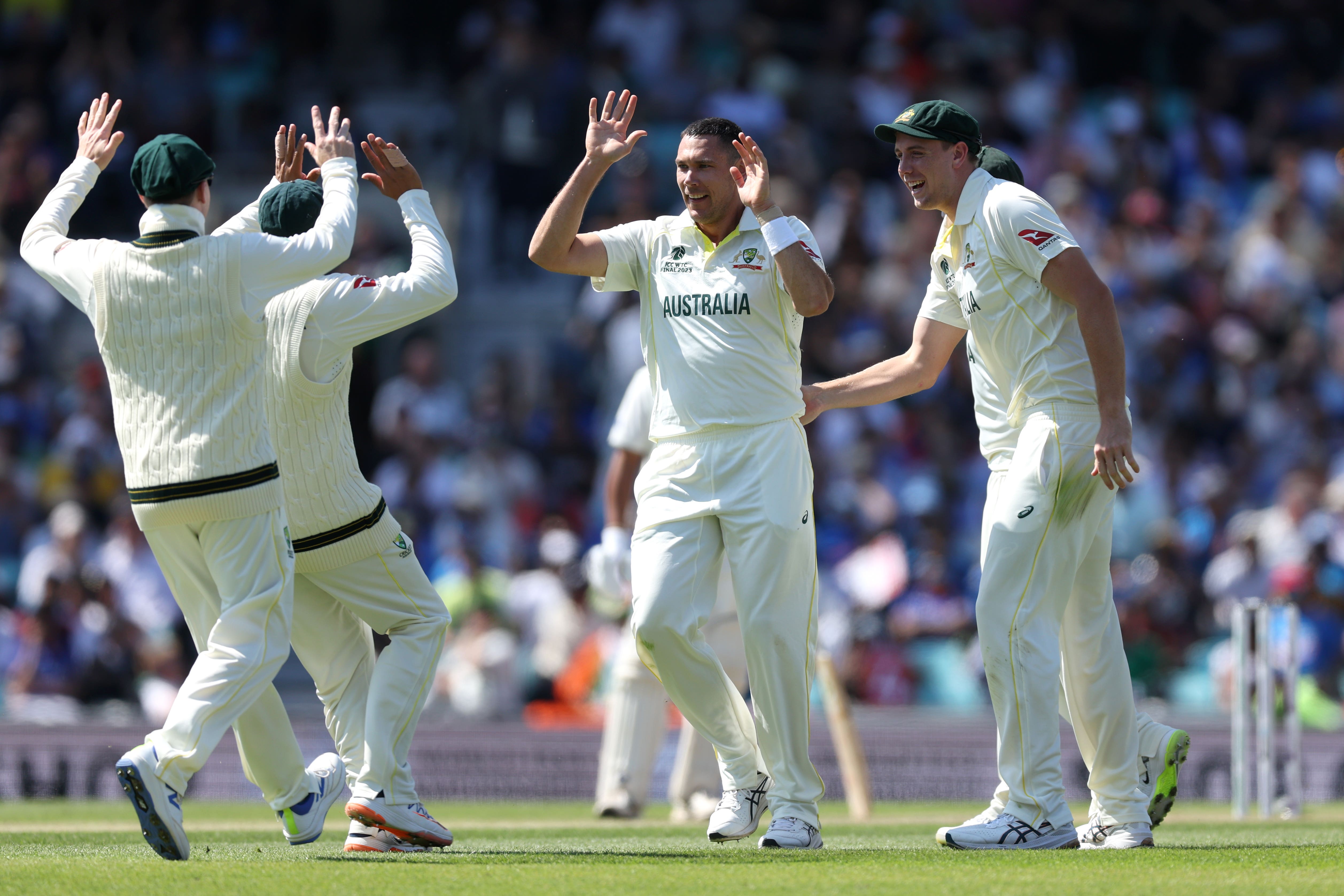 Australia’s Scott Boland (centre) celebrates taking the wicket of India’s Shubman Gill (Steven Paston/PA)