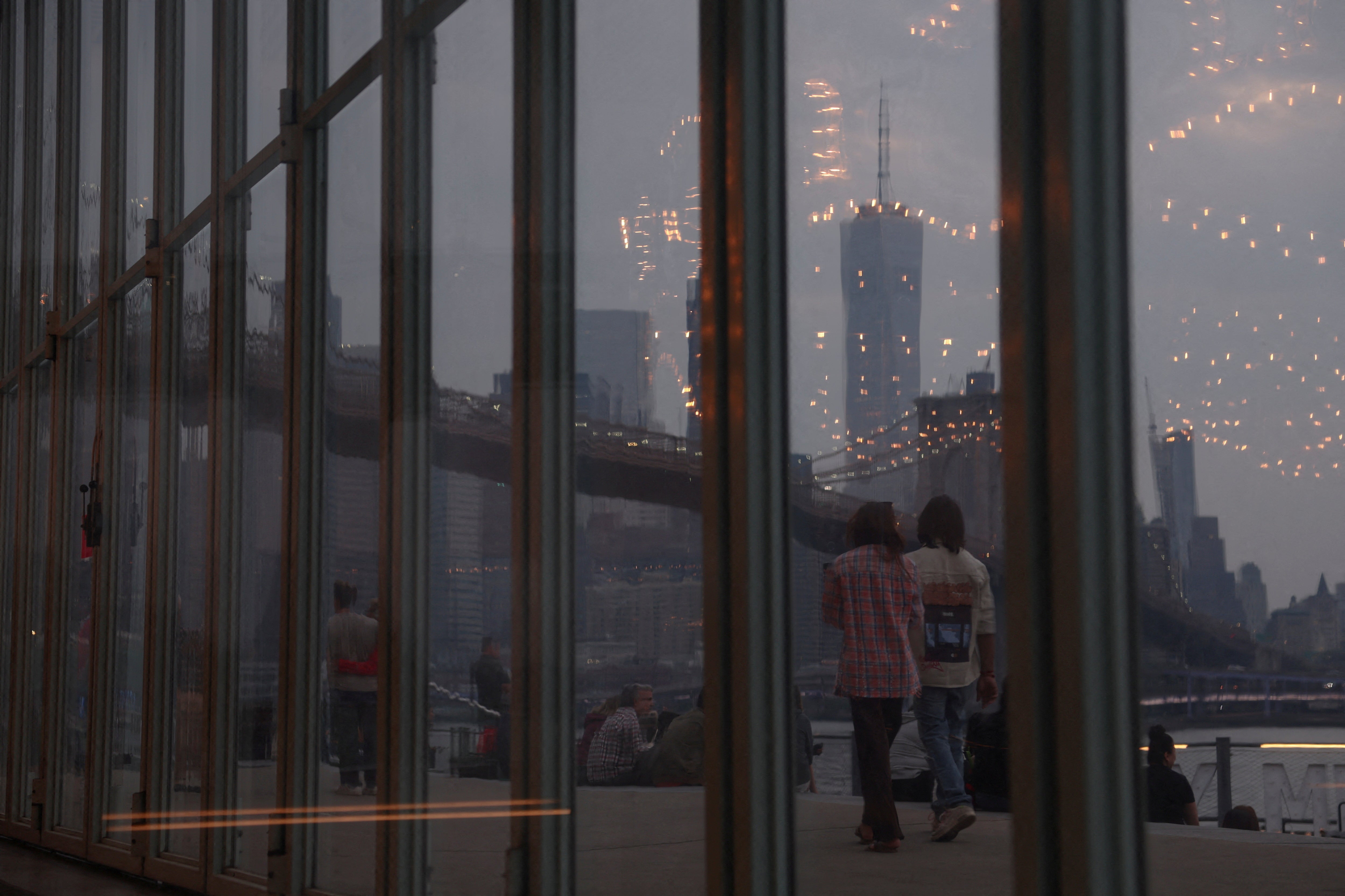 Haze and smoke continued to shroud Manhattan skyline on Thursday evening