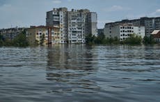 A dam collapses and thousands face the deluge — often with no help — in Russian-occupied Ukraine