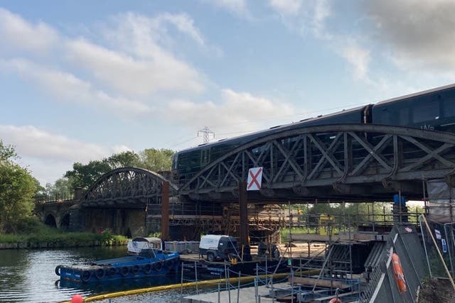 A key rail route has reopened after a 10-week closure due to an unsafe viaduct (Network Rail/PA)