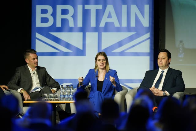 Left to right, Ed Taylor, director of public affairs, CityFibre, Dehenna Davison parliamentary under secretary of state for levelling up, and Ben Houchen, Tees Valley mayor, on stage during the Northern Research Group conference at Doncaster Racecourse (Danny Lawson/PA)