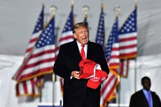 Some in Georgia GOP seek purity test as Trump appears at convention in aftermath of indictment