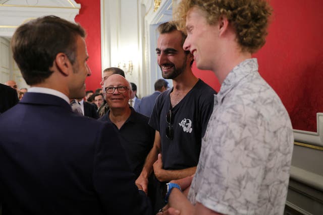 <p>Emmanuel Macron meets Henri, the 24-year-old ‘backpack hero’ </p>